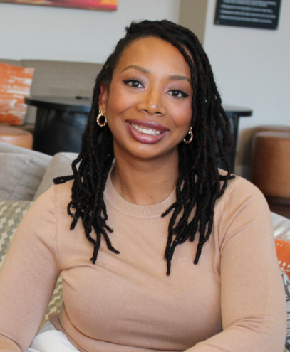 Close-up of April Ornelas smiling in her living room
